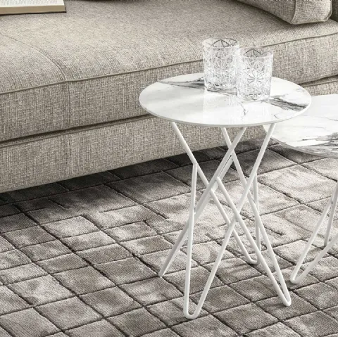 Tavolino rotondo in ceramica effetto marmo Stellar di Calligaris