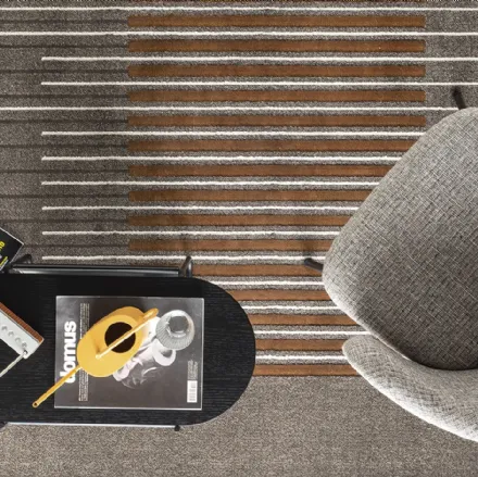 Tappeto che si ispira alle grafiche razionaliste del 900 in chiave contemporanea Uptown di Calligaris