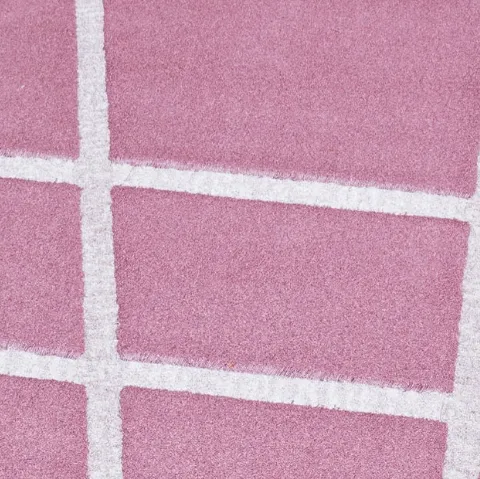 Tappeto rotondo rosa con linee bianche Vivienne di Besana Moquette