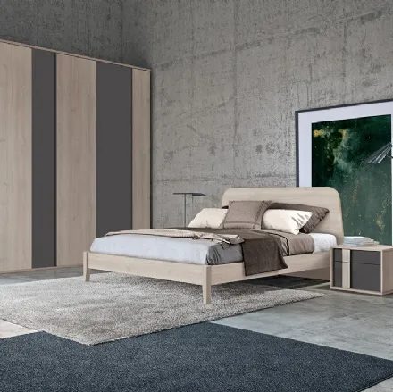 Letto matrimoniale Golf Virgo con struttura e testiera in legno chiaro di Colombini Casa