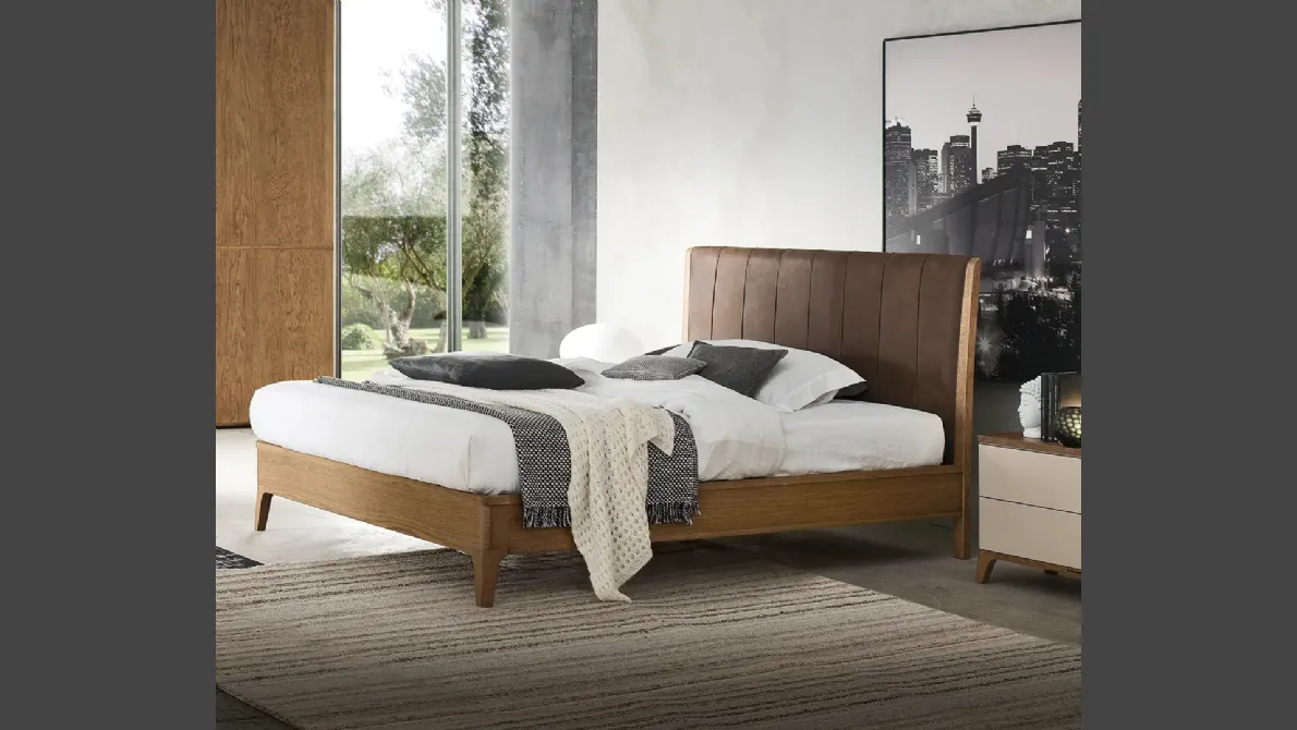 Letto Nirvana in legno con testiera in pelle di Le Fablier