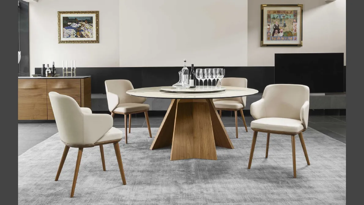 Tavolo rotondo con piano in ceramica e basamento in legno Icaro di Calligaris